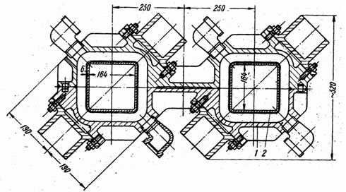Поперечный разрез кристаллизатора для одновременной отливки двух слитков квадратного сечения
